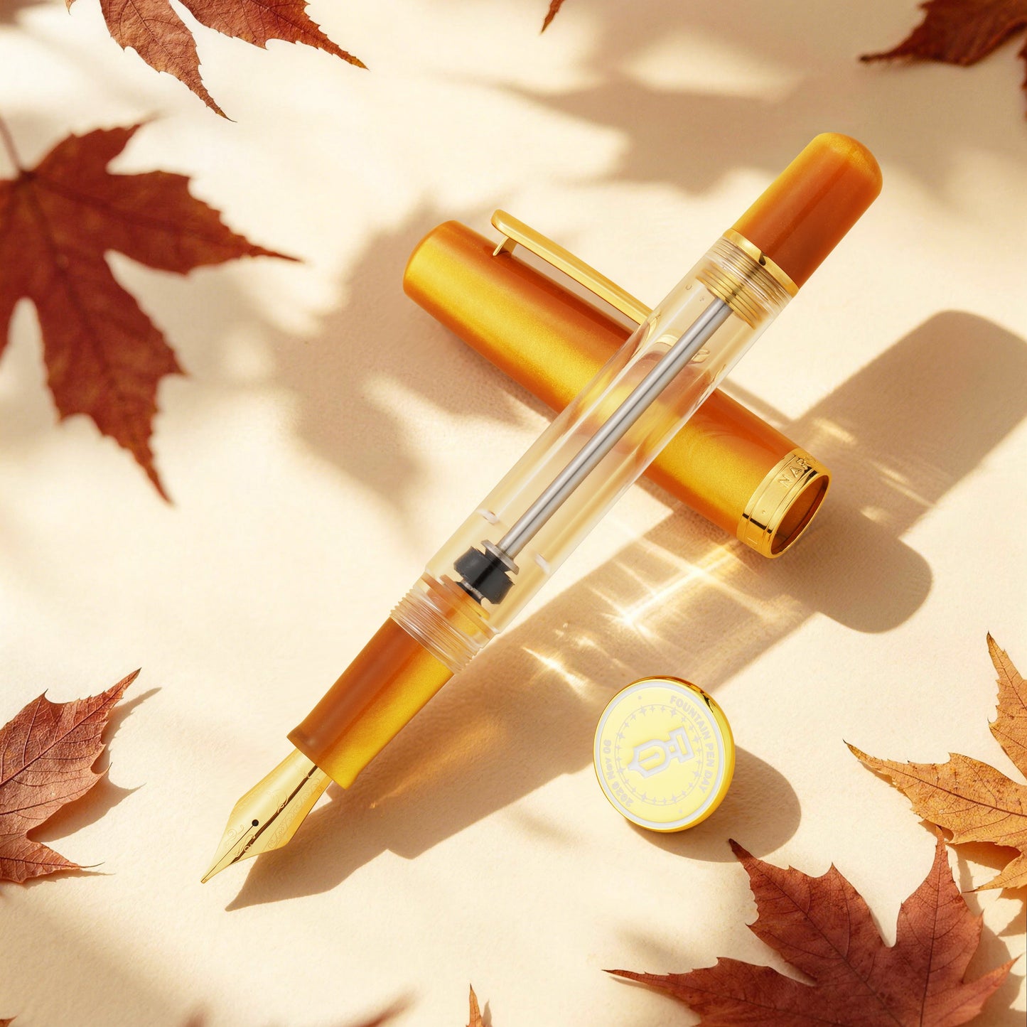 Nahvalur Original Plus fountain pen with amber-orange accents.