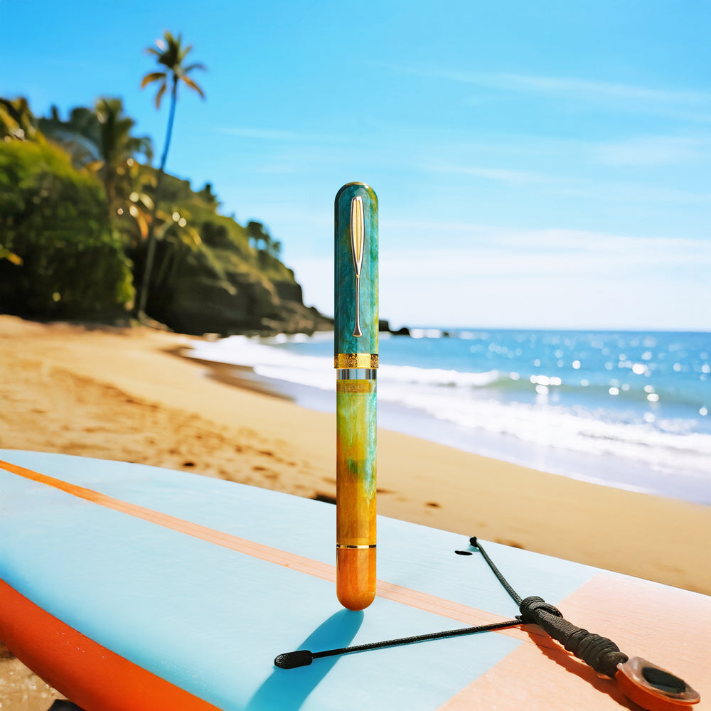 Fountain pen on a surfboard with a beach and palm trees in the background